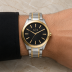 Armani Exchange AX2336 men's two-tone black watch on wrist