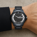 Armani Exchange AX2401 men's gunmetal watch on wrist