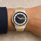 Armani Exchange AX2403 men's two-tone watch on wrist