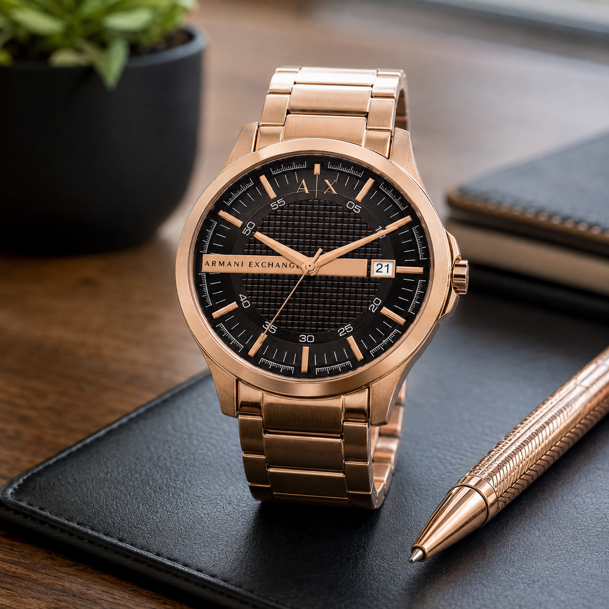 Armani Exchange AX2449 men's rose gold and black watch desk setting