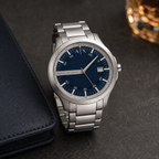 Armani Exchange AX2451 men's silver and navy watch desk setting