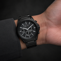 Armani Exchange AX2601 men's black chronograph watch on inner wrist