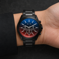 Armani Exchange AX2615 men's black blue red chronograph watch on inner wrist