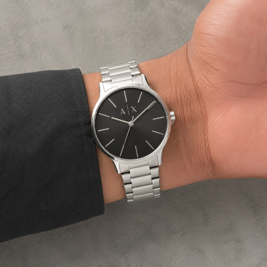 Armani Exchange AX2700 men's silver black minimalist watch on inner wrist