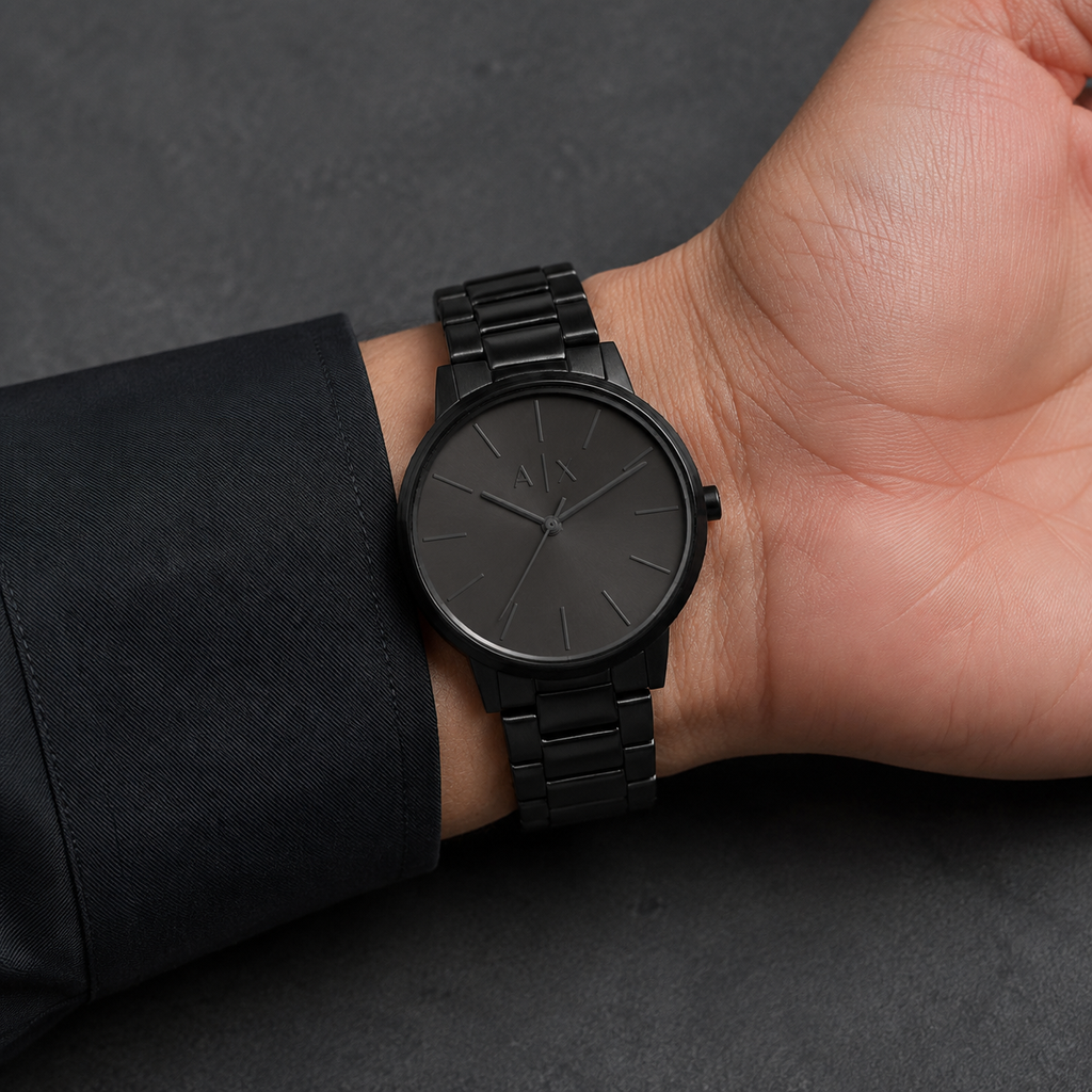 Armani Exchange AX2701 men's all black minimalist watch on inner wrist