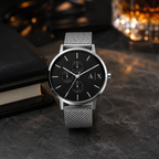 Armani Exchange AX2714 silver mesh watch desk scene