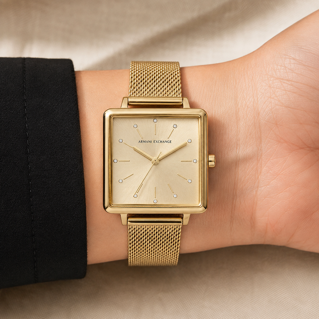 AX5535 women's gold square mesh watch worn on the inner wrist