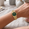 Michael Kors MK4842 petite green dial on a woman's wrist
