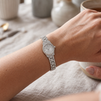 Michael Kors MK4864 silver-tone pavé watch on a woman's wrist