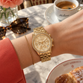 Michael Kors MK7530 Mini Bryant gold-tone pavé watch, woman's wrist