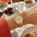Michael Kors MK7530 Mini Bryant gold-tone pavé watch, woman's wrist