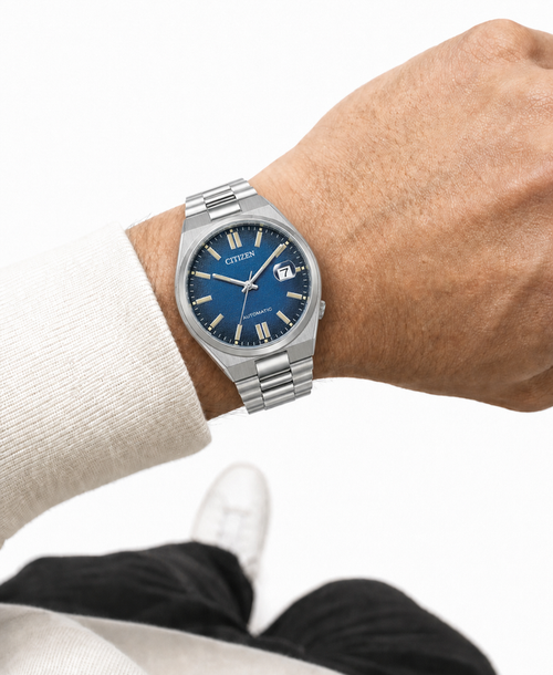 Citizen NJ0151-88L blue dial automatic watch worn naturally on the wrist