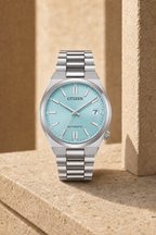 Citizen NJ0200-50L ice blue dial automatic watch in a warm limestone setting