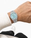 Citizen NJ0200-50L ice blue dial automatic watch worn naturally on the wrist