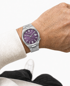 Citizen NJ0200-50W purple dial automatic watch worn naturally on the wrist