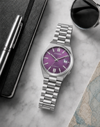 Citizen NJ0200-50W purple dial automatic watch in a premium marble flat-lay