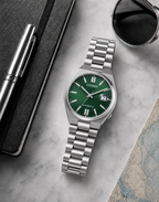 Citizen NJ0200-50X green dial automatic watch in a premium marble flat-lay