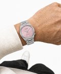 Citizen NJ0200-50Z pink dial automatic watch worn naturally on the wrist