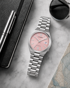 Citizen NJ0200-50Z pink dial automatic watch in a premium marble flat-lay