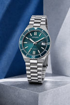Citizen NJ0231-56L turquoise dial automatic watch on a cool blue-grey stone display