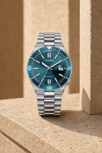Citizen NJ0231-56L turquoise dial automatic watch in a warm limestone setting