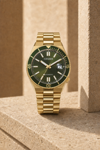 Citizen NJ0232-53X green dial automatic watch in a warm limestone setting