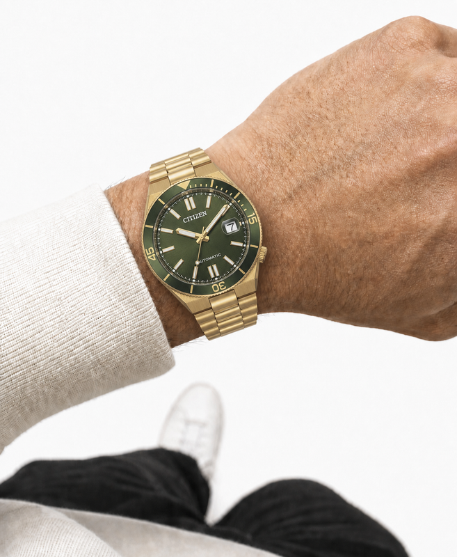 Citizen NJ0232-53X green dial automatic watch worn naturally on the wrist