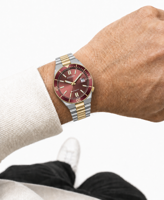 Citizen NJ0234-58X wine red dial automatic watch worn naturally on the wrist