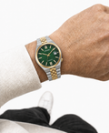 Citizen NK0024-54X green dial automatic watch worn naturally on the wrist