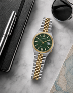 Citizen NK0024-54X green dial automatic watch in a premium marble flat-lay