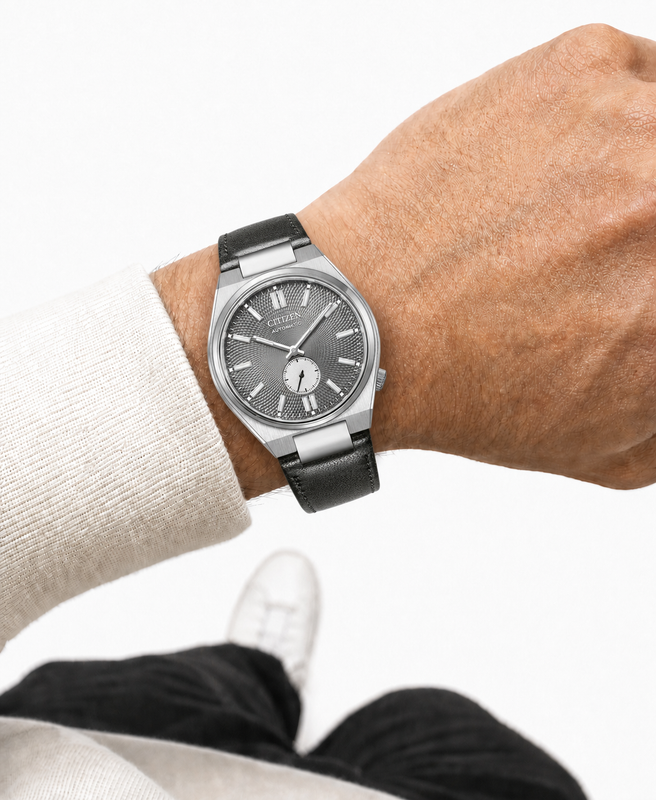 Citizen NK5010-01H grey dial automatic watch worn naturally on the wrist