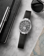 Citizen NK5010-01H grey dial automatic watch in a premium marble flat-lay