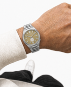 Citizen NK5010-51X gold dial automatic watch worn naturally on the wrist