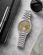 Citizen NK5010-51X gold dial automatic watch in a premium marble flat-lay