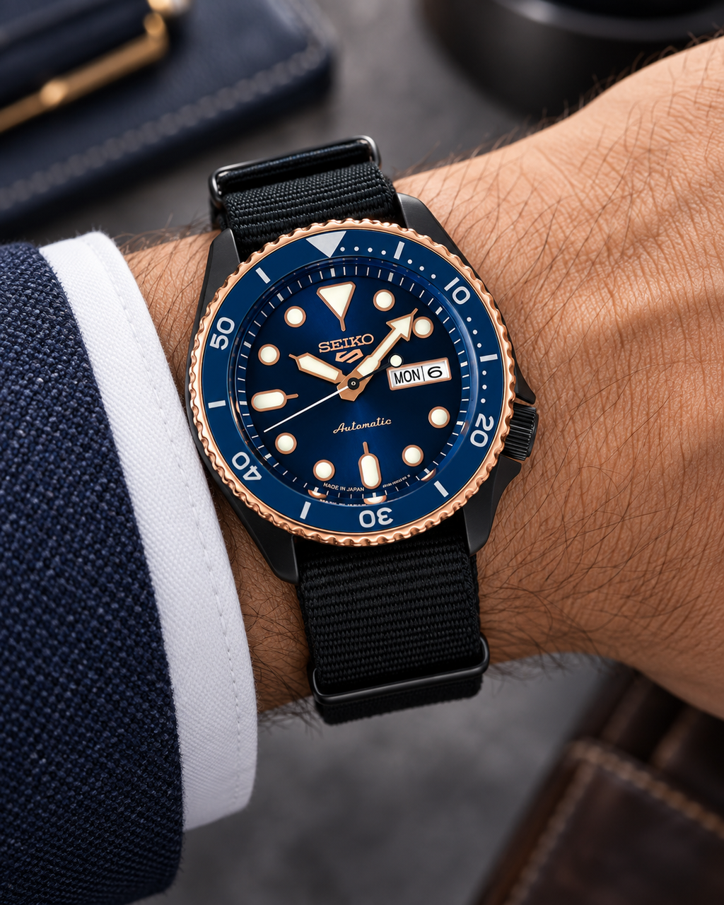 Seiko 5 Sports SBSA098 automatic blue dial watch on wrist