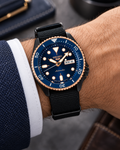 Seiko 5 Sports SBSA098 automatic blue dial watch on wrist