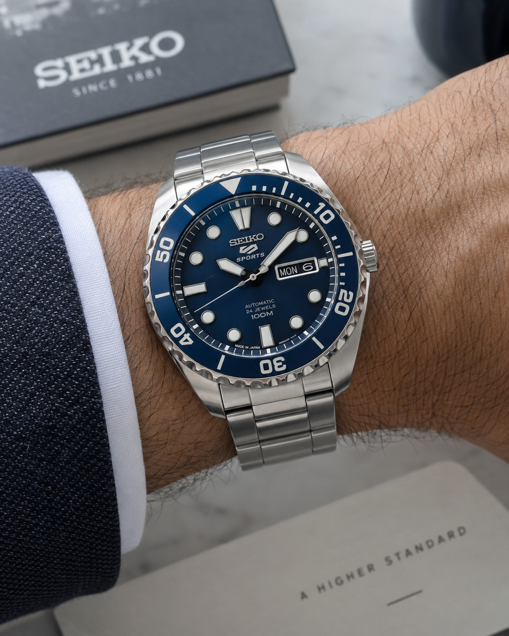 Seiko 5 Sports SRPC63J1 automatic men's watch blue dial on wrist