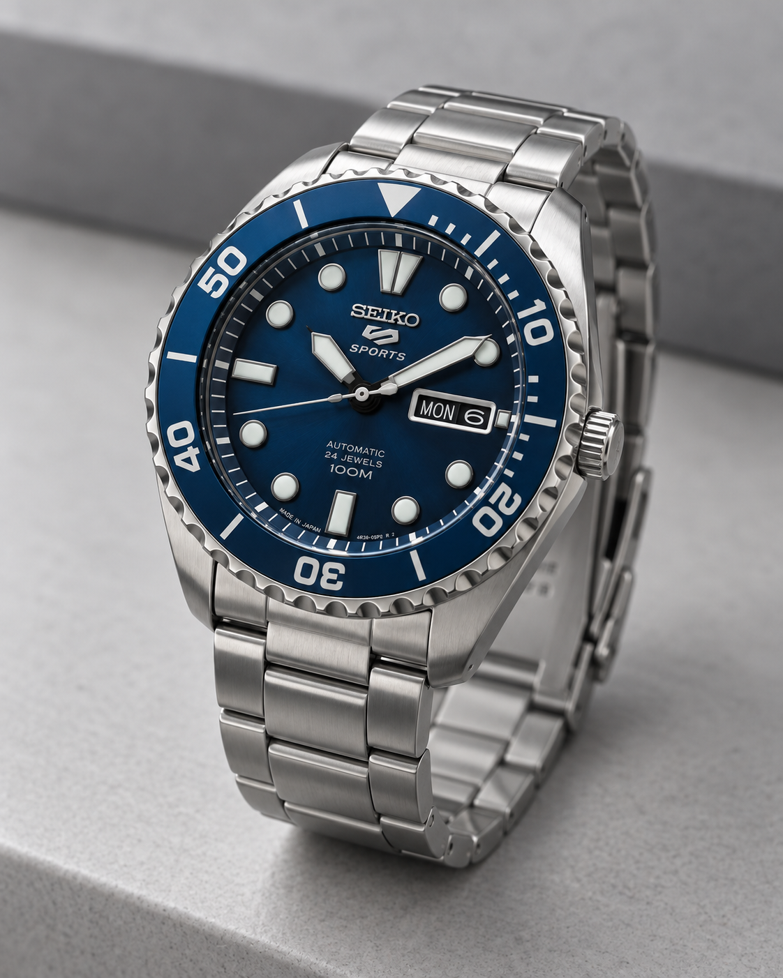 Seiko 5 Sports SRPC63J1 Bottle Cap automatic men's watch blue dial three-quarter view