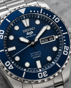 Seiko 5 Sports SRPC63J1 blue dial day-date automatic watch macro detail
