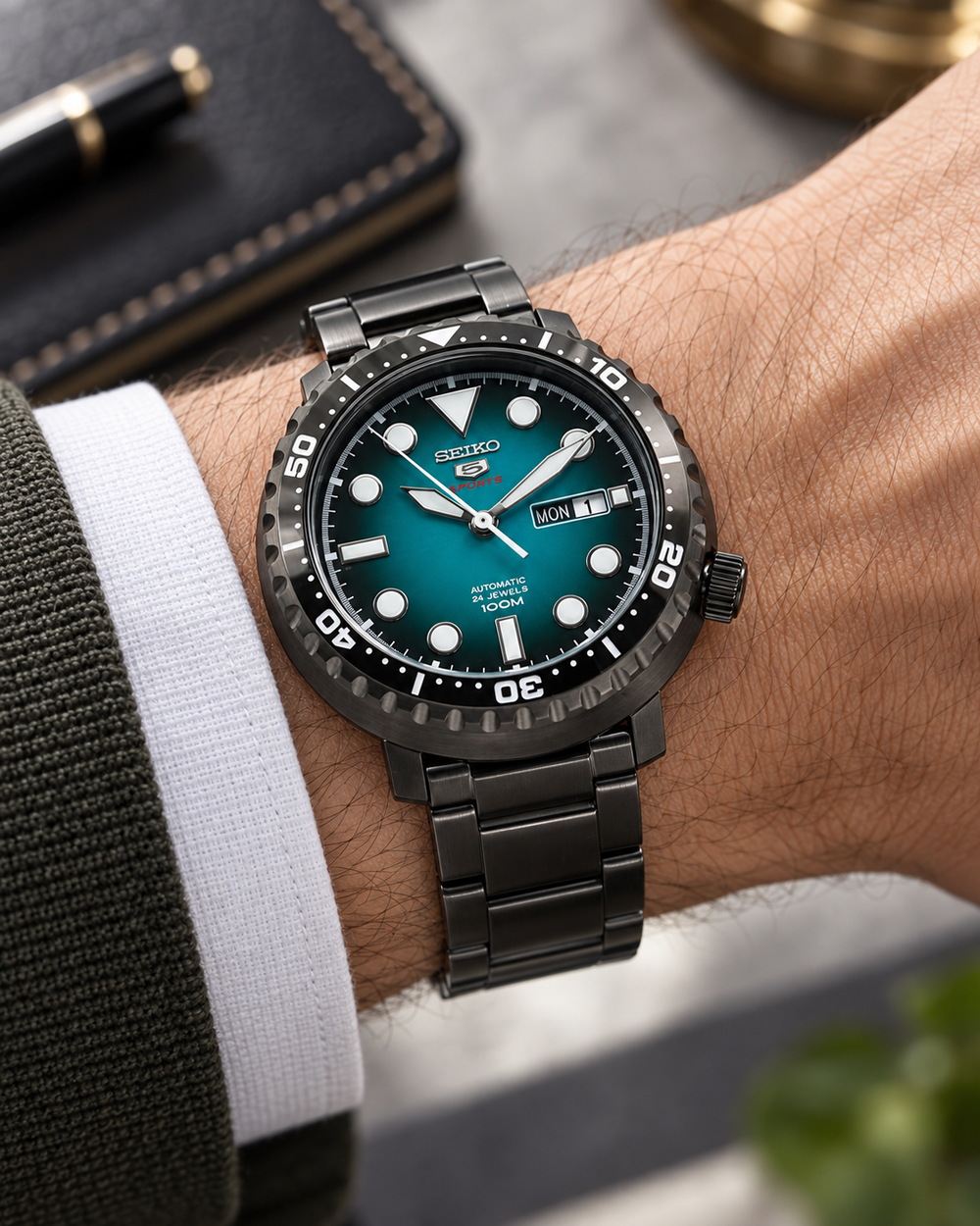 Seiko 5 Sports SRPC65J1 Bottle Cap automatic turquoise green dial men's watch on wrist