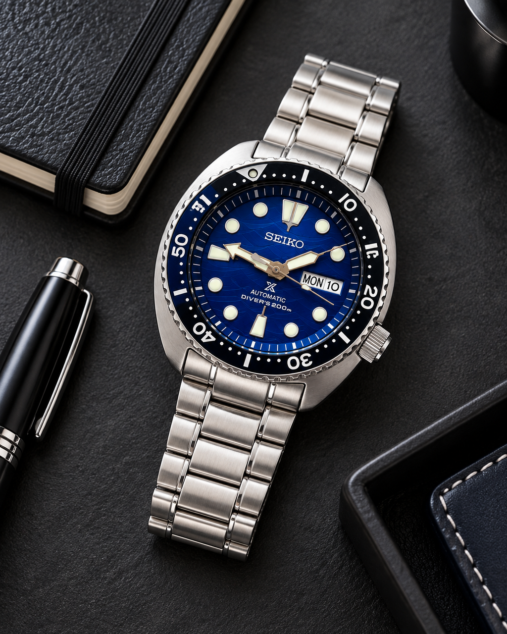 Seiko Prospex SRPD21J1 Save the Ocean Turtle automatic diver blue dial stainless steel watch desk view