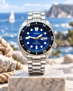 Seiko Prospex SRPD21J1 Save the Ocean Turtle automatic diver blue dial watch by the sea