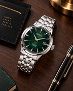 Seiko Presage SRPE15J1 automatic green dial stainless steel bracelet desk view