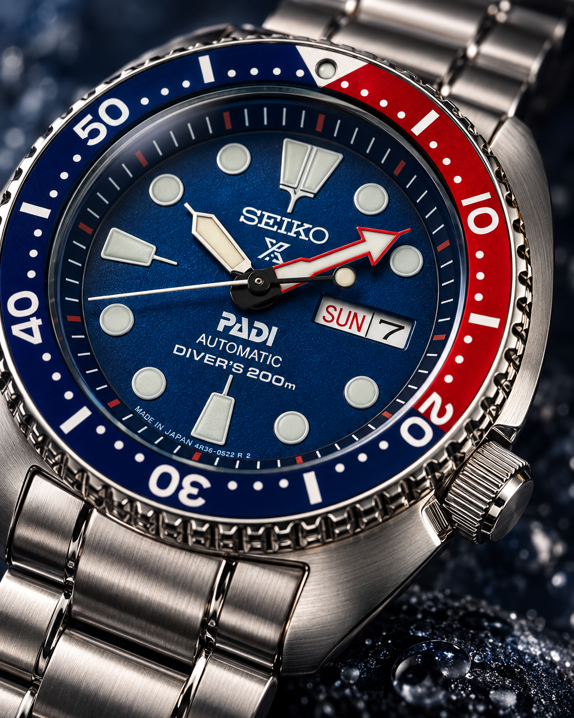 Seiko Prospex PADI Turtle SRPE99 blue dial and red-blue bezel macro detail, automatic diver's watch