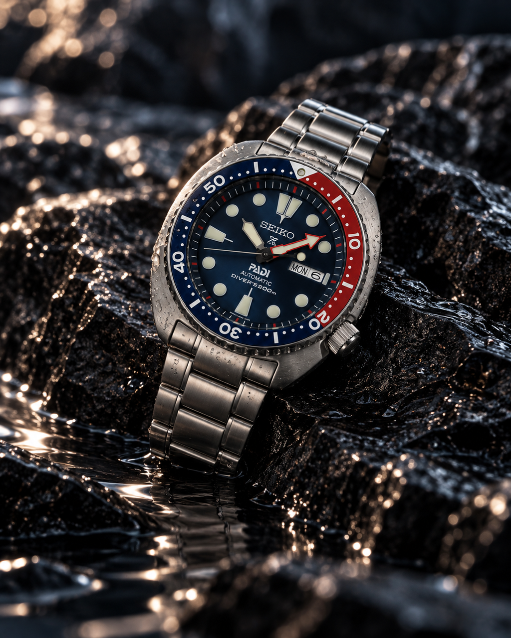 Seiko Prospex PADI Turtle SRPE99K1 automatic diver's watch on wet volcanic rock