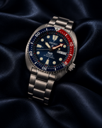 Seiko Prospex PADI Turtle SRPE99K1 on midnight navy satin