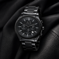 Armani Exchange AX1058 black chronograph watch on black fabric