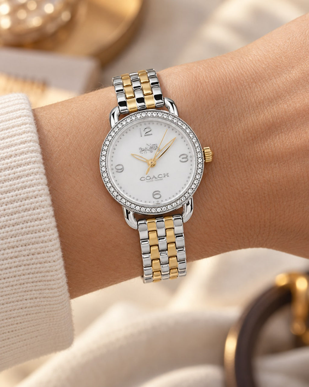 Coach watch 145024100 worn on wrist