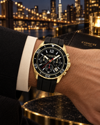 Coach Kent 14602564 gold-tone and black silicone chronograph on wrist
