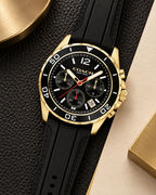 Coach Kent 14602564 gold-tone and black silicone chronograph luxury flat lay